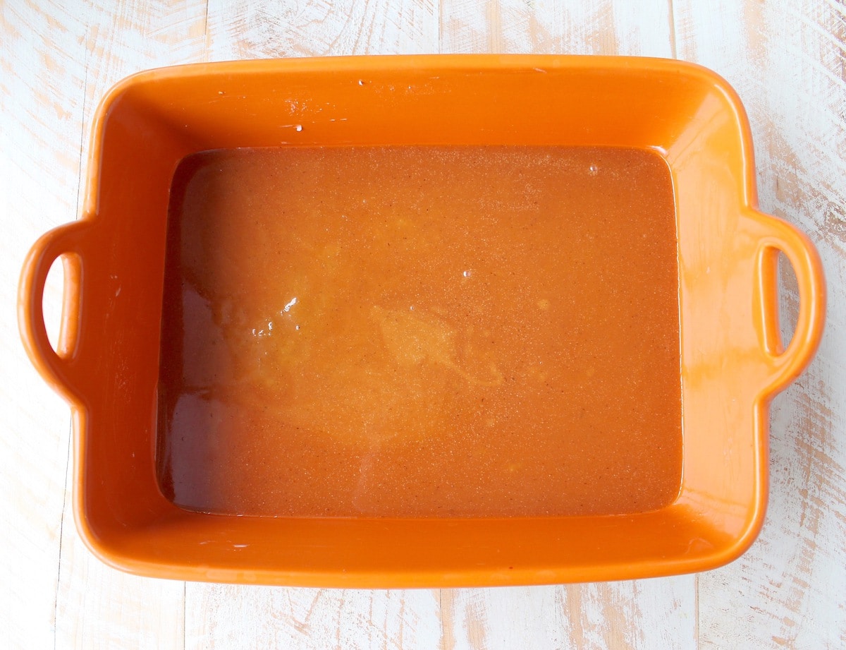 salted caramel sauce in orange baking dish