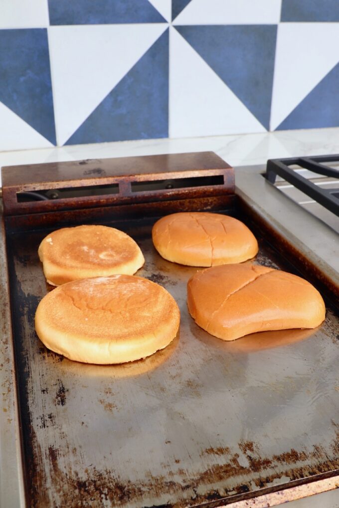 hamburger buns on griddle