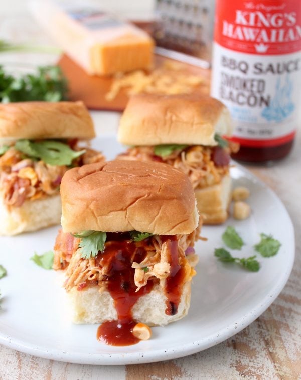 These scrumptious BBQ Chicken Salad Sliders are made with BBQ chicken tossed with cheddar cheese, bacon, corn & onions, served on sweet Hawaiian rolls!