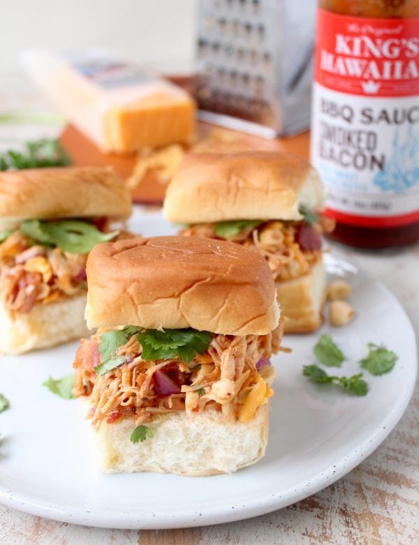 These scrumptious BBQ Chicken Salad Sliders are made with BBQ chicken tossed with cheddar cheese, bacon, corn & onions, served on sweet Hawaiian rolls!