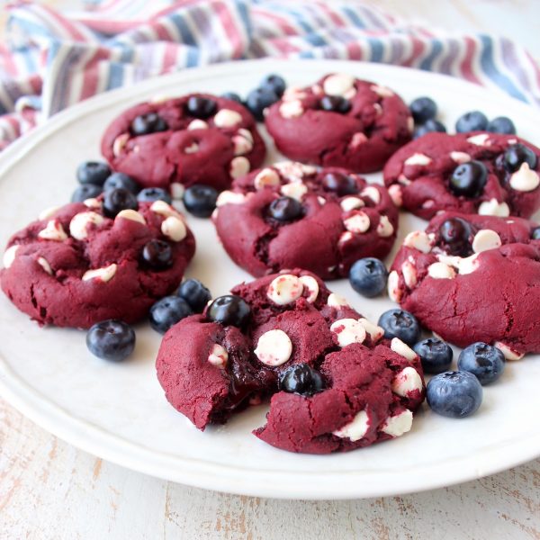 Red Velvet Cookies are filled with white chocolate chips and blueberries in this colorful and patriotic dessert recipe, perfect for summer and 4th of July!