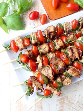 The easiest & most delicious Tomato Basil Chicken Skewers are made with marinated chicken, cherry tomatoes & fresh basil for a healthy, gluten free meal!