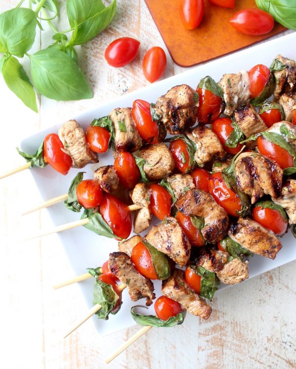 The easiest & most delicious Tomato Basil Chicken Skewers are made with marinated chicken, cherry tomatoes & fresh basil for a healthy, gluten free meal!