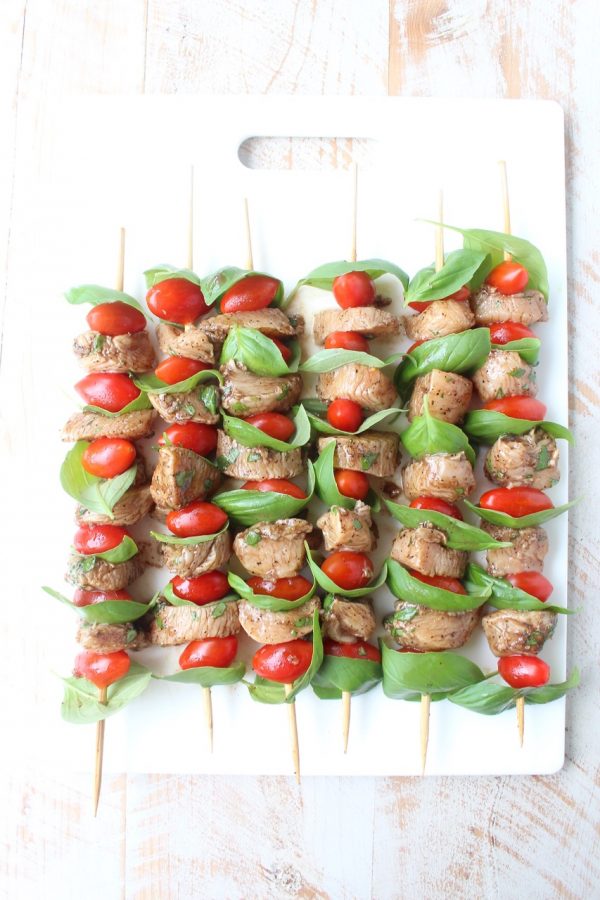 The easiest & most delicious Tomato Basil Chicken Skewers are made with marinated chicken, cherry tomatoes & fresh basil for a healthy, gluten free meal!