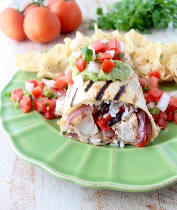 If you love Chipotle burritos, then you're really going to love these grilled burritos, filled with fajita grilled chicken, veggies & cilantro lime rice!