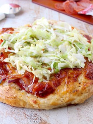 All of the ingredients in a traditional Italian Sub, like salami, pepperoni & provolone, top this delicious Italian Sub Pizza Recipe, easily made in under 30 minutes in the oven or on the grill!