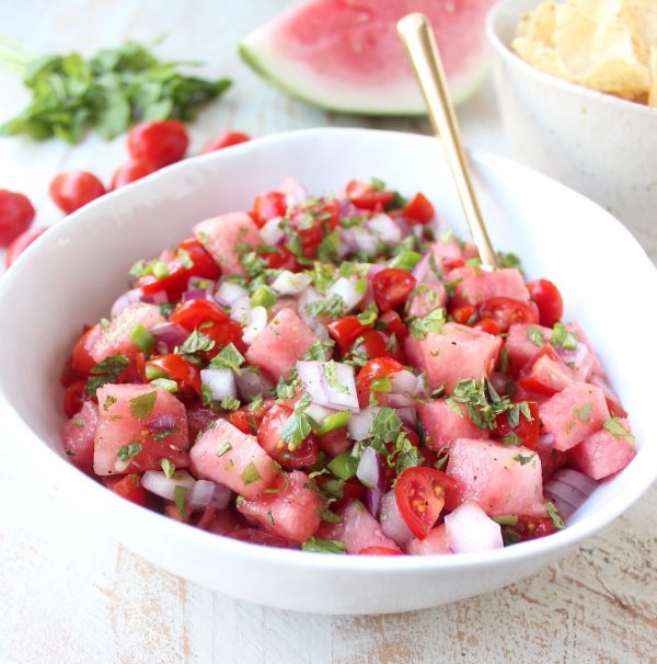 Watermelon salsa is refreshing, flavorful and will be the hit of the summer! Serve it with tortilla chips for a vegan and gluten free snack or serve it over chicken, fish or tacos for a delicious meal!