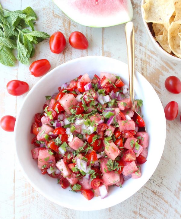 Watermelon salsa is refreshing, flavorful and will be the hit of the summer! Serve it with tortilla chips for a vegan and gluten free snack or serve it over chicken, fish or tacos for a delicious meal!