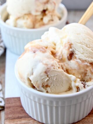 scoops of ice cream in white bowls