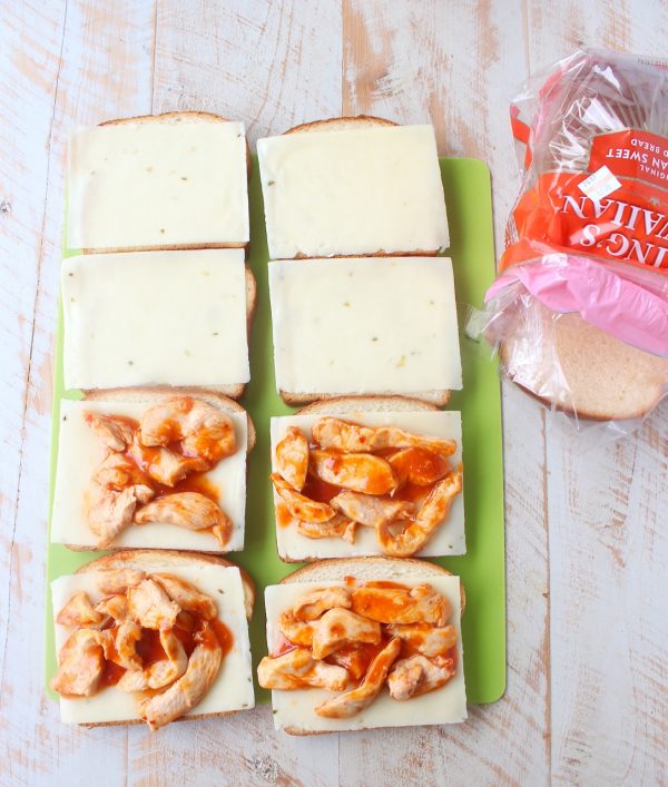 Hot sauce sautéed chicken, pepper jack cheese and a spicy, creamy sauce make up this deliciously saucy and cheesy Spicy Chicken Panini recipe!