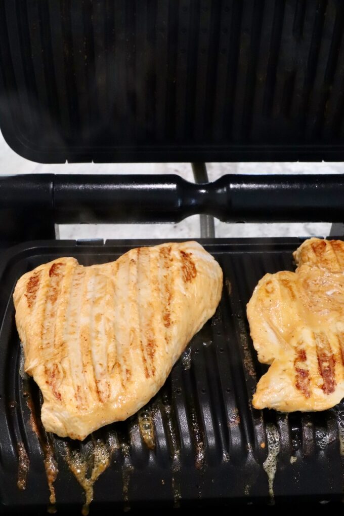 grilled chicken breasts in an indoor grill