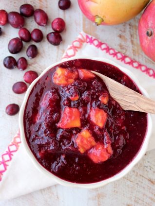 Chipotle peppers & fresh mango add smokey, sweet & tropical flavors to a traditional cranberry sauce, delicious as a ham glaze or perfect served with turkey!