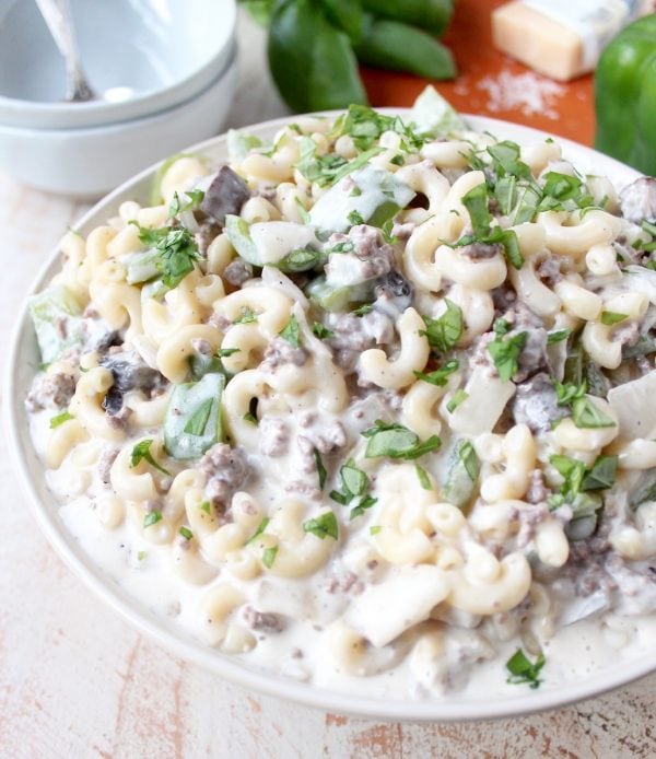 This insanely delicious Mac and Cheese recipe is a seriously scrumptious twist on the Philly Cheesesteak and it's easily made in only 29 minutes!