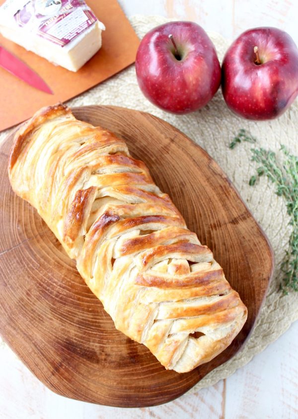 Warm caramelized apples & creamy brie cheese are wrapped up in a puff pastry for an easy & delicious apple strudel recipe, great for breakfast, an appetizer or dessert!