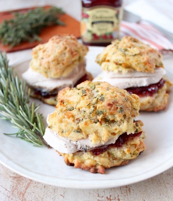biscuit, turkey and cranberry sliders on plate 