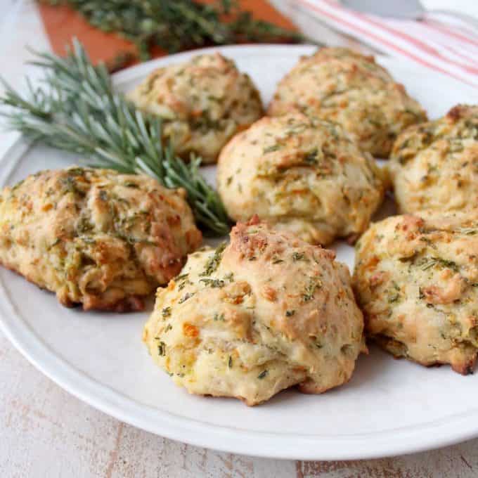 stuffing biscuits on plate with fresh rosemary