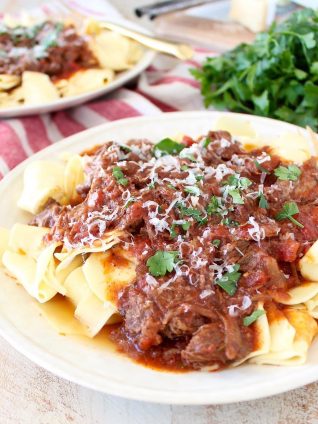 Create the delicious taste and texture of a slow cooked beef ragu sauce in under an hour with this Instant Pot Beef Ragu recipe!