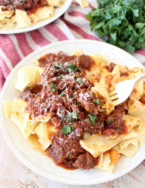Create the delicious taste and texture of a slow cooked beef ragu sauce in under an hour with this Instant Pot Beef Ragu recipe!
