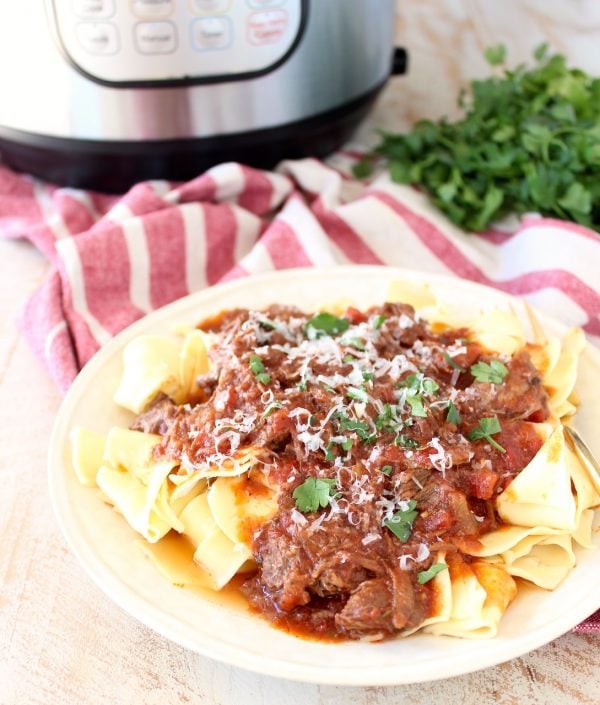 Create the delicious taste and texture of a slow cooked beef ragu sauce in under an hour with this Instant Pot Beef Ragu recipe!