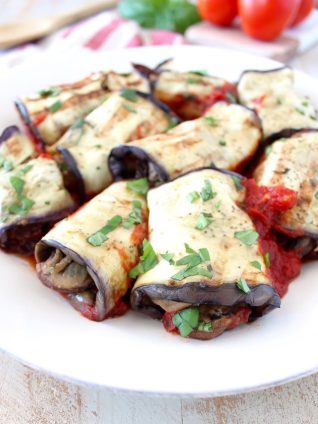 Italian seasoned ground turkey and mushrooms fill these delicious eggplant roll ups, baked in a flavorful tomato sauce. This recipe is gluten free, dairy free and Whole30 compliant!