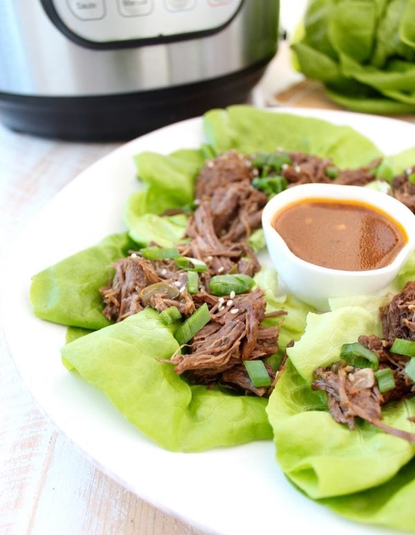 Whole30 Thai Beef is easy to make in the Instant Pot in under an hour. Shred the beef and serve it in lettuce wraps for a Whole30 meal or serve it in corn tortillas for a gluten free Thai twist on Taco Tuesday!