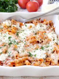 Three cheese baked ziti with ricotta, mozzarella and parmesan is an easy 6 ingredient, 29 minute meal that is sure to become a weeknight dinner family favorite!
