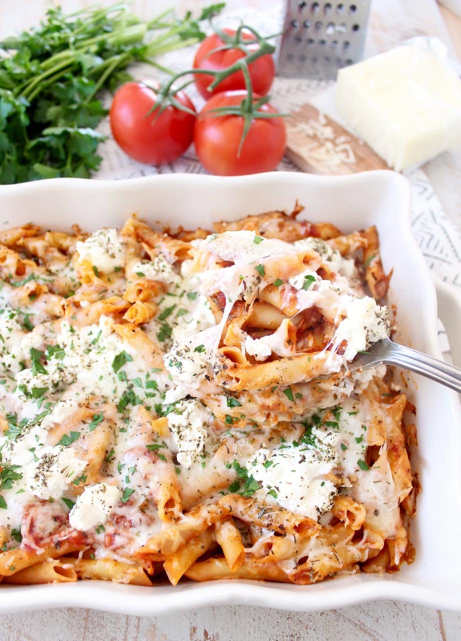 baked pasta with cheese on top in casserole dish