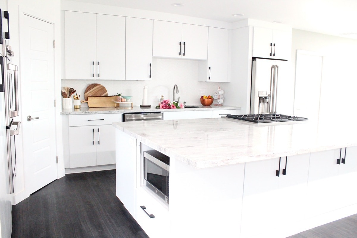 White Kitchen with New River White Granite Countertops and Large 12 foot island