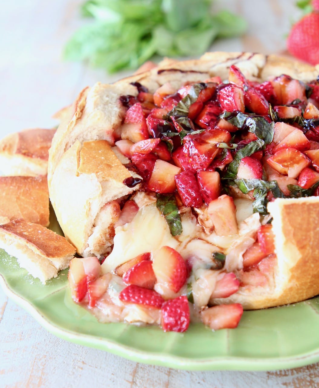 Baked Brie in Sourdough Bread Bowl with Strawberries and Balsamic Glaze