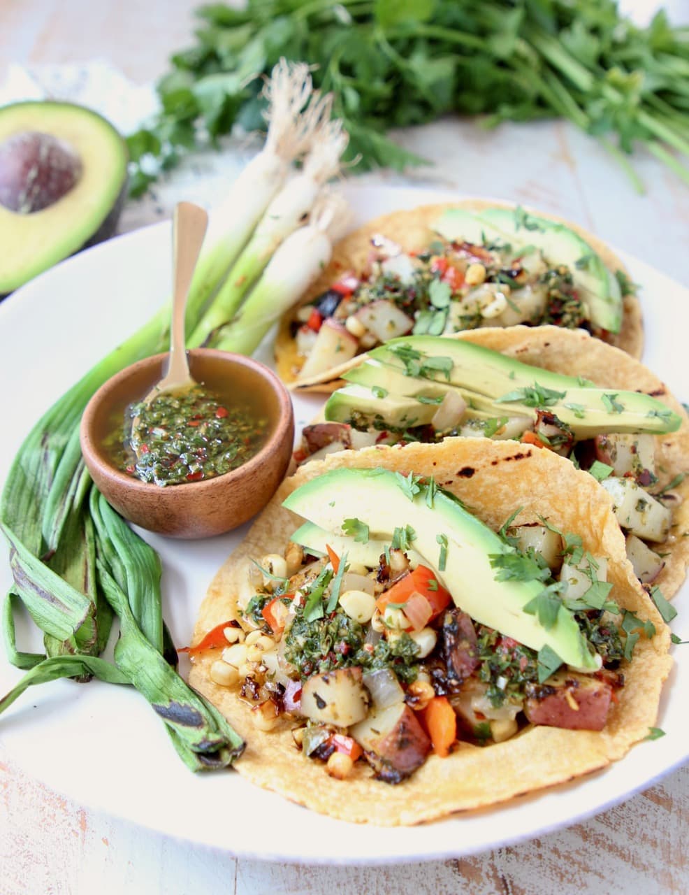 Grilled Vegan Tacos with Potatoes, Peppers, Avocado and Chimichurri Sauce