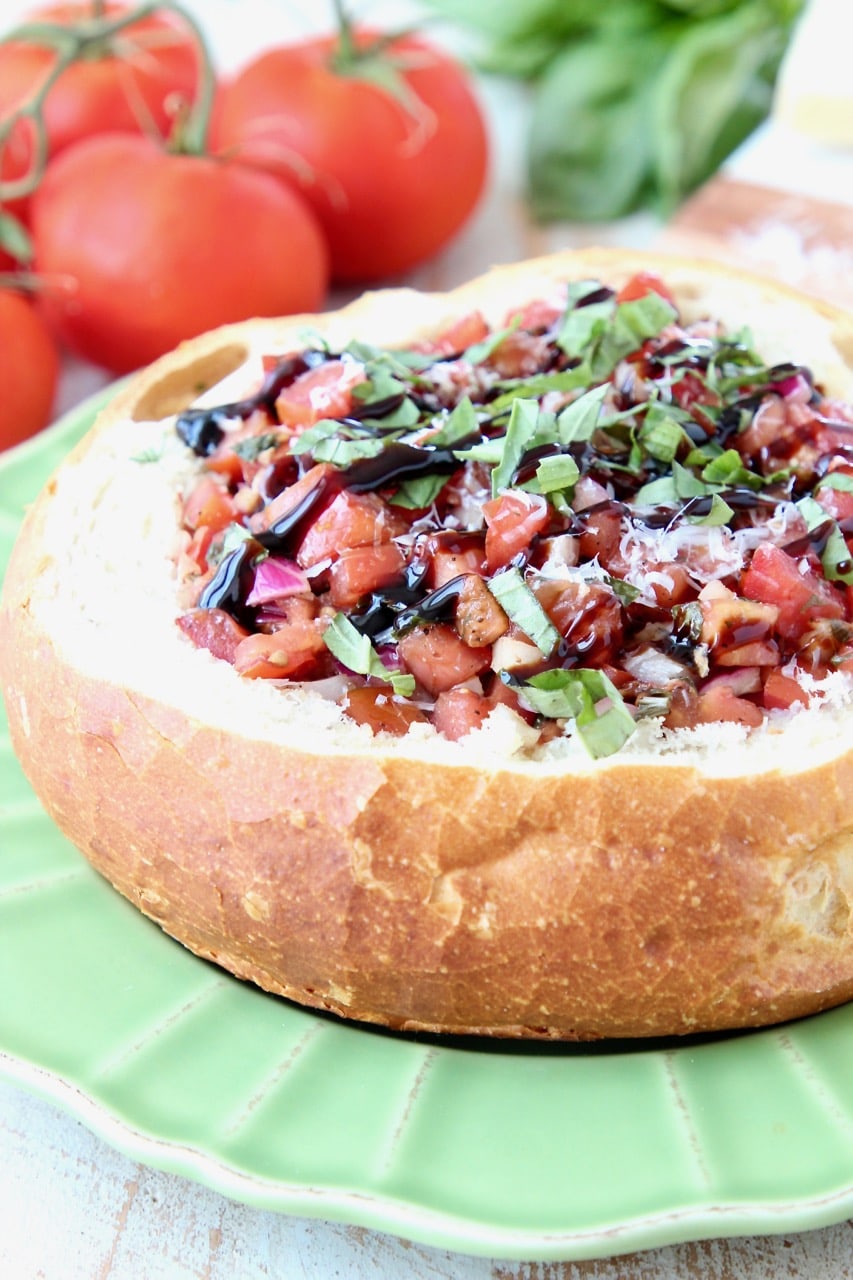 Baked Brie in a Bread Bowl with Tomato Basil Bruschetta and Balsamic Reduction