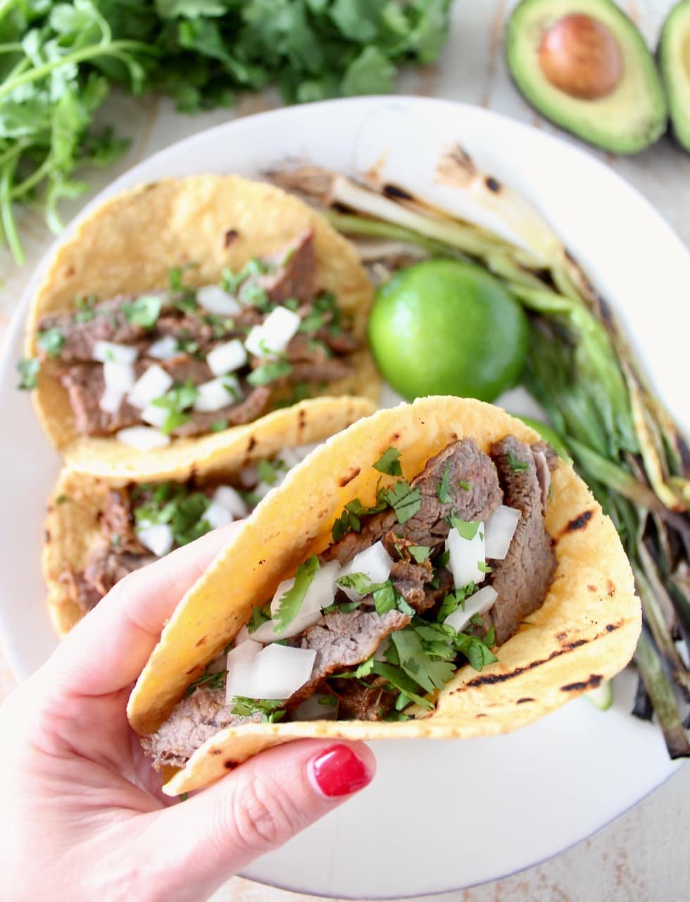 Carne Asada Tacos with Onions, Cilantro and Grilled Green Onions