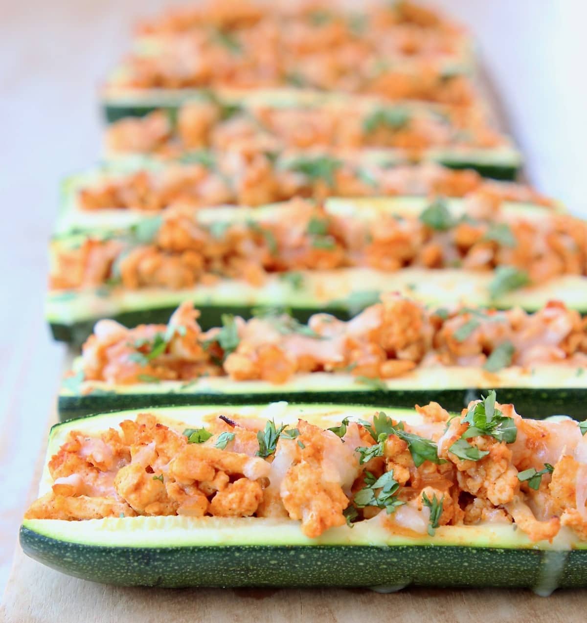 Buffalo Chicken Zucchini Boats with Pepper Jack Cheese and Cilantro