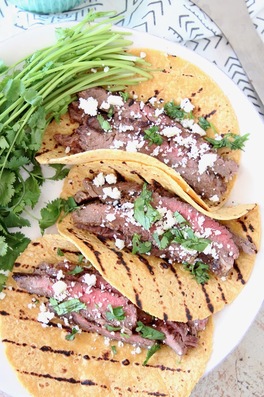 Cajun Steak Tacos with Grilled Corn Tortillas, Cotija Cheese and Fresh Cilantro