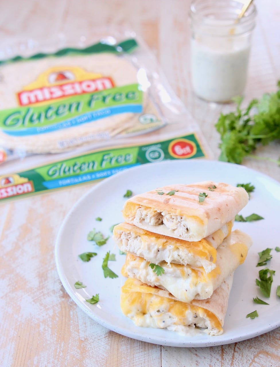 Gluten Free Tortillas in package with Gluten Free Chicken Ranch Wraps grilled and cut in half