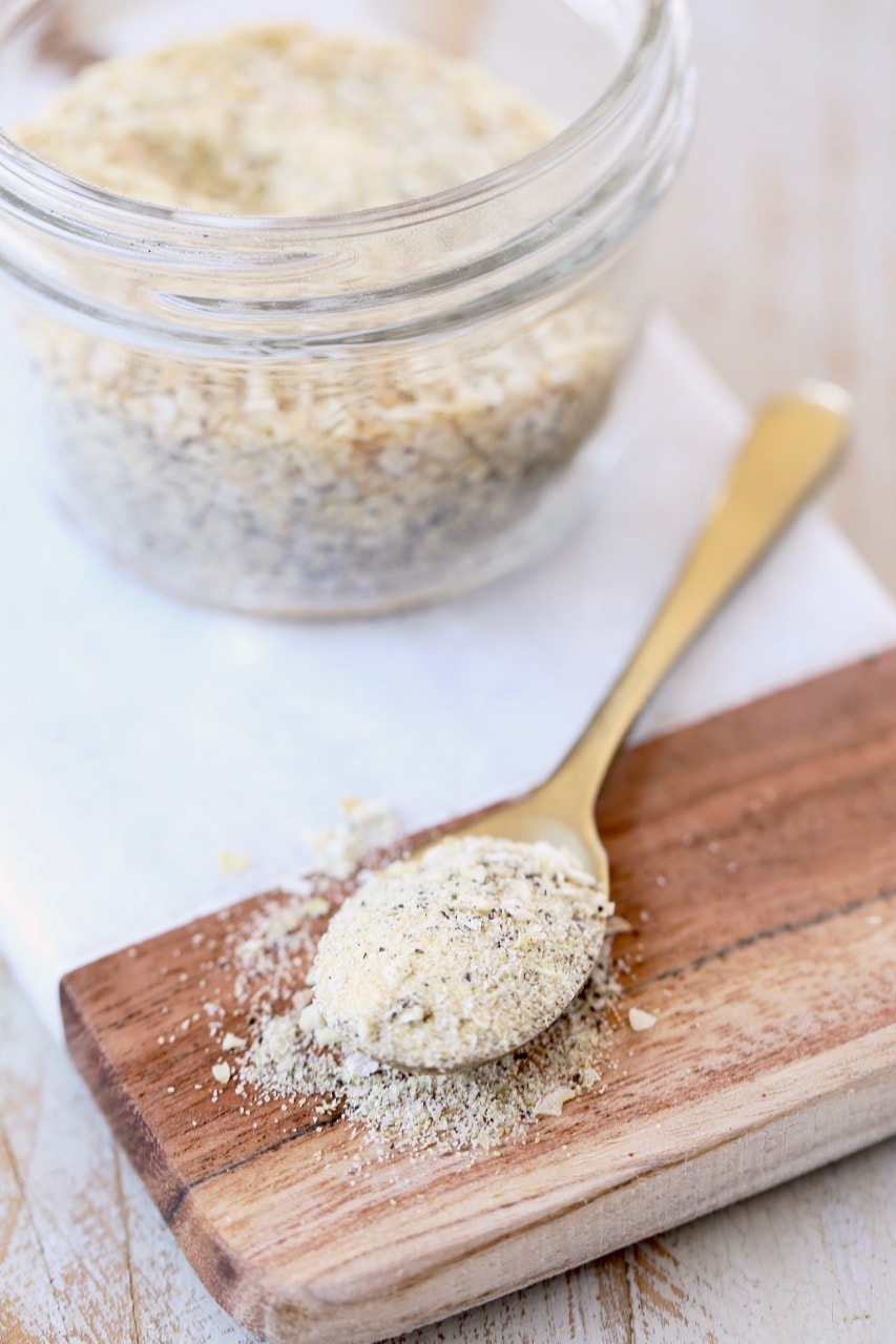 French Onion Dip Mix in Small Gold Spoon on Wood and Marble Cutting Board with Mason Jar