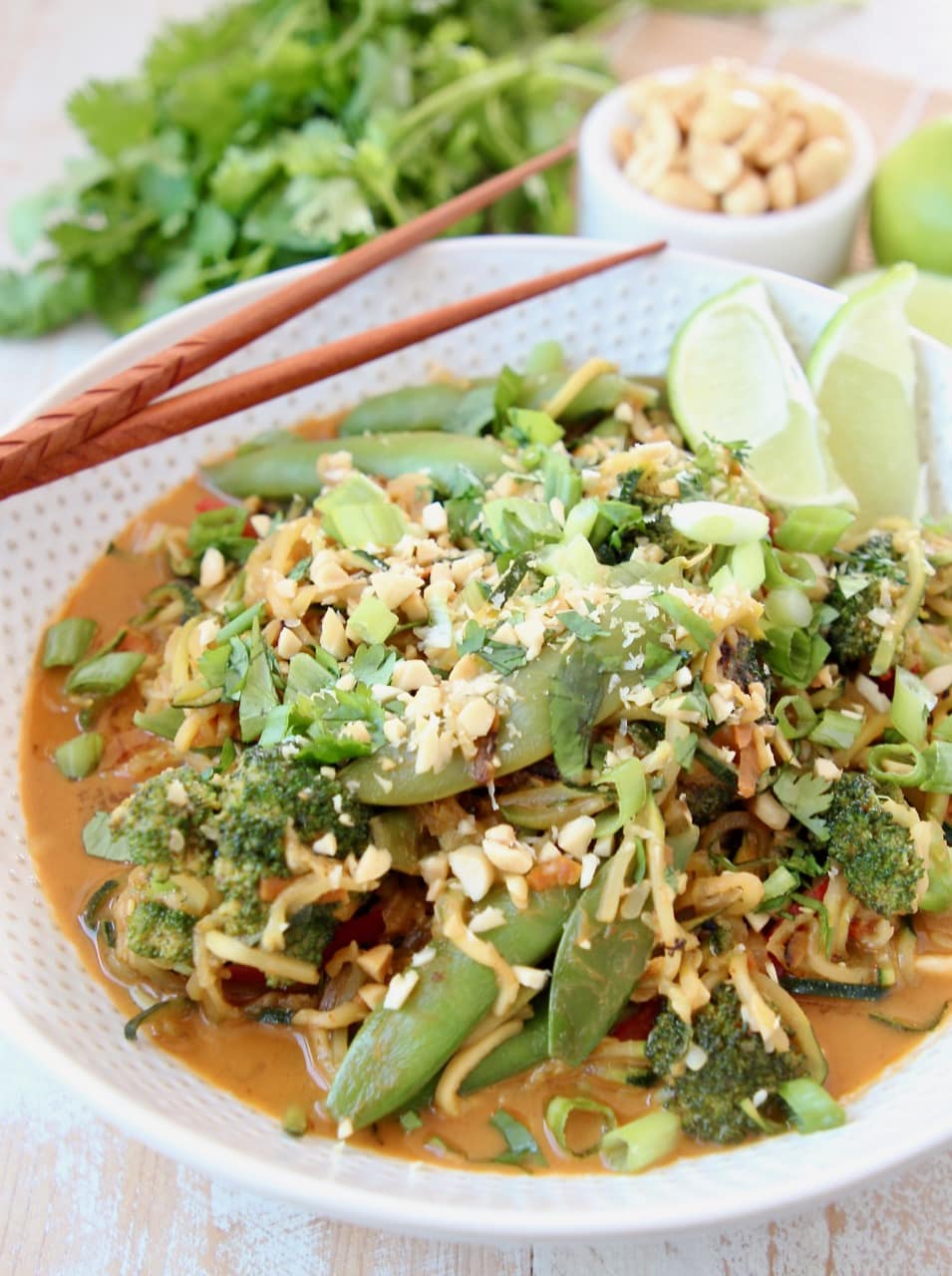 Vegan Pad Thai with Zucchini Noodles, Broccoli, Sugar Snap Peas, Carrots, Pad Thai Peanut Sauce, Scallions and Limes