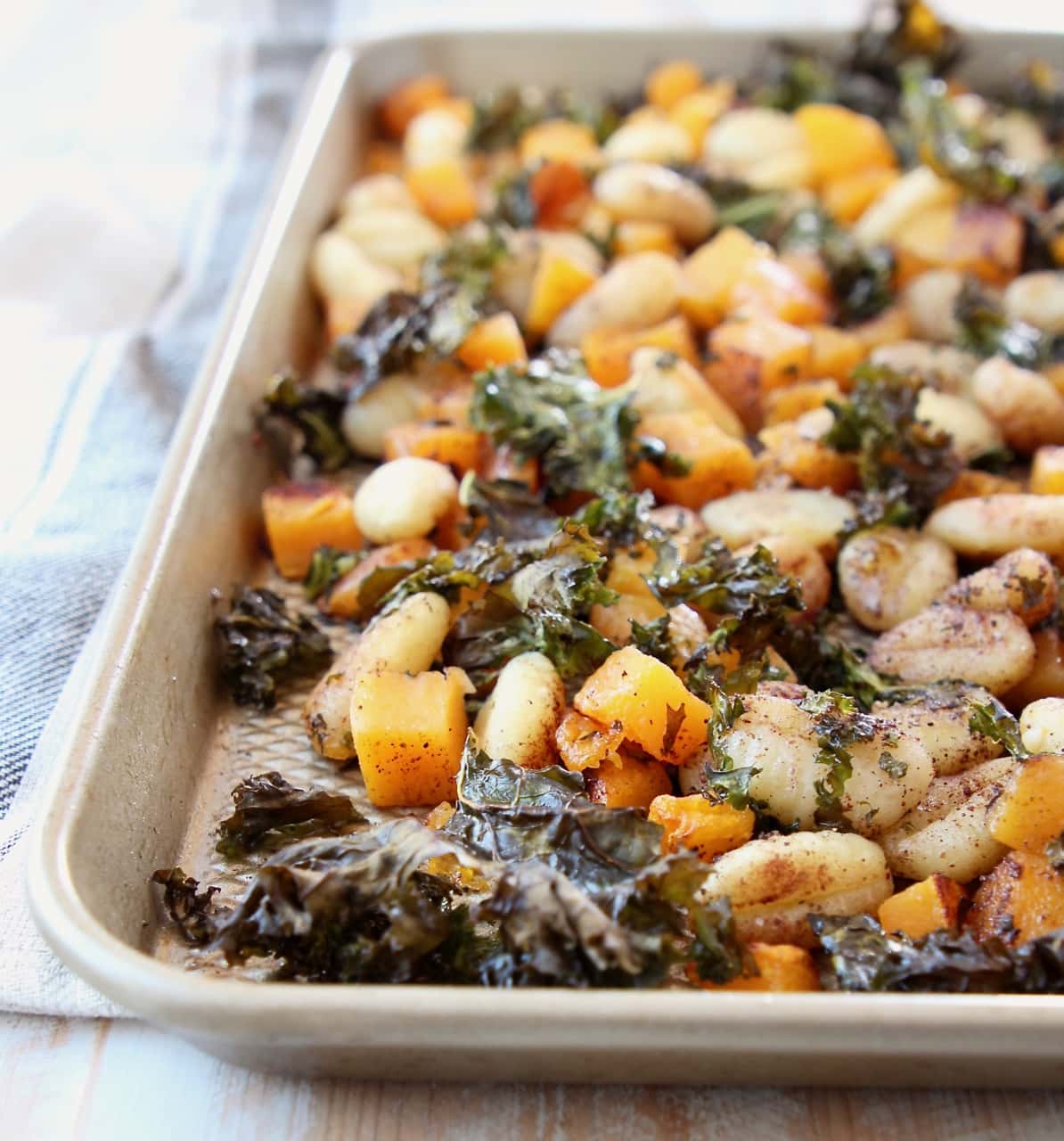 Baked gnocchi, butternut squash and kale on sheet pan