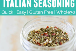 Italian seasoning in a mason jar and in a small gold spoon, with text overlay "Italian Seasoning, quick, easy, gluten free, whole30"