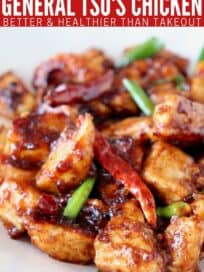 general tso's chicken with red chilies and scallions on plate