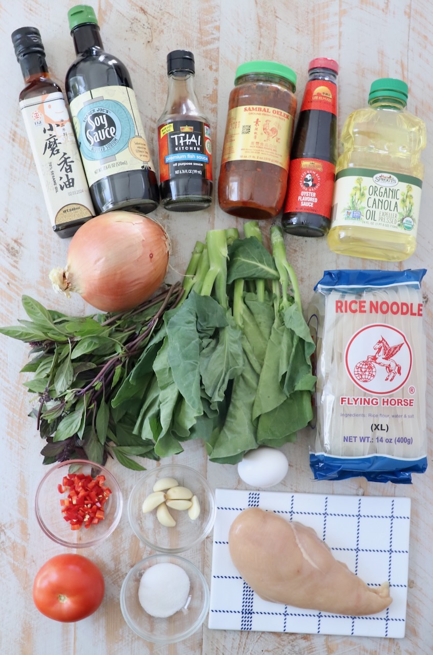 ingredients for drunken noodles on white wood board