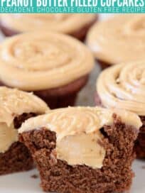 chocolate cupcakes cut open with peanut butter filling in the middle