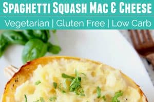 Roasted spaghetti squash tossed with cheese sauce in squash shell