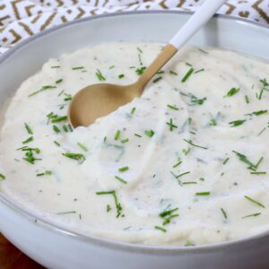 mashed cauliflower in a bowl with a spoon