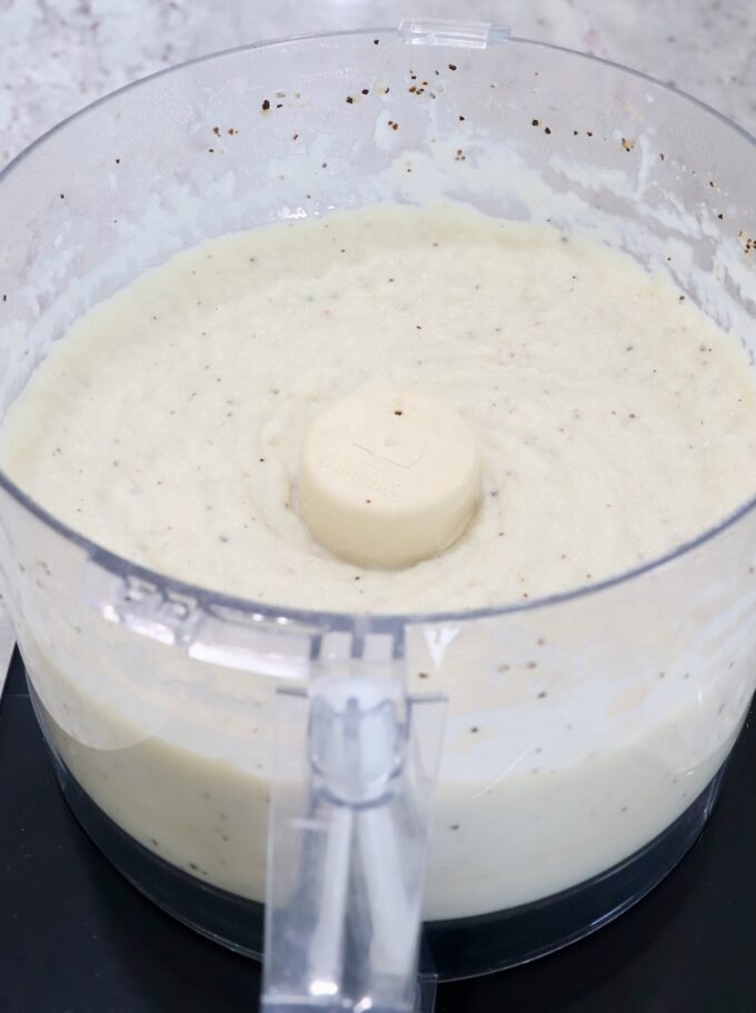 pureed cauliflower in a food processor