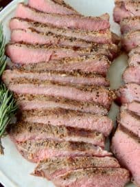 sliced sous vide tri tip steak on plate