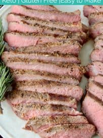 Sliced sous vide steak on plate