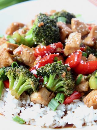 Teriyaki chicken and broccoli over rice on plate