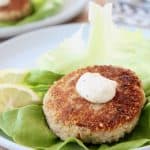 Crispy tuna patties, topped with garlic aioli on a piece of butter lettuce