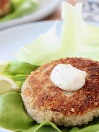 Crispy tuna patties, topped with garlic aioli on a piece of butter lettuce